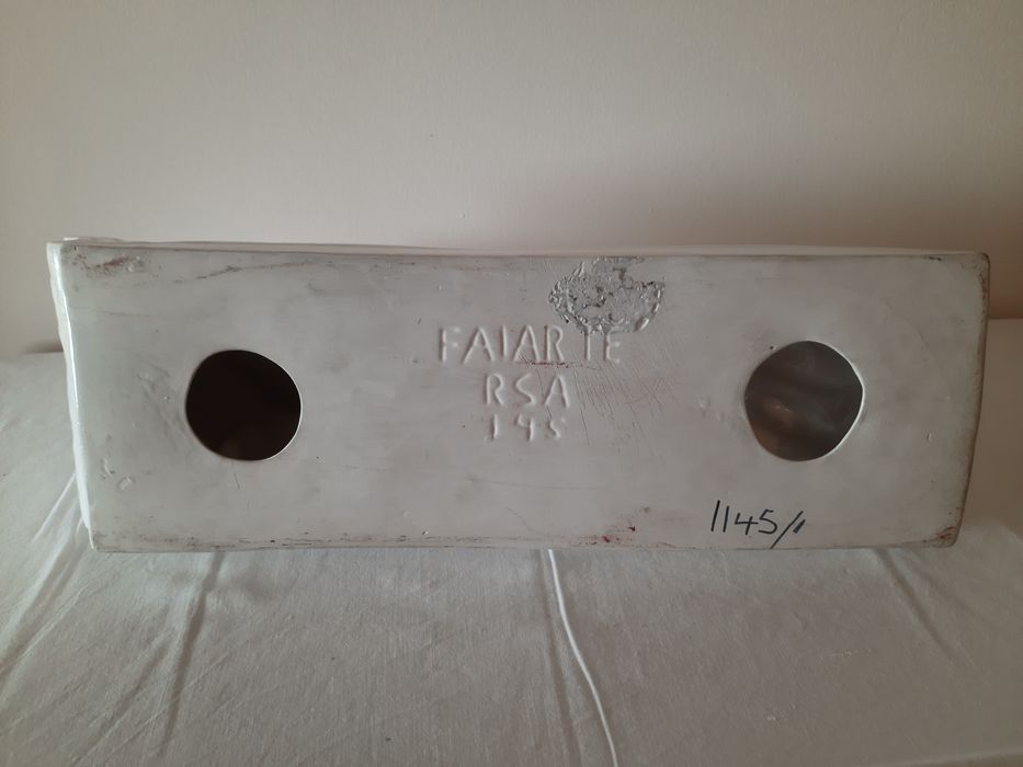 Boneca branca cerâmica