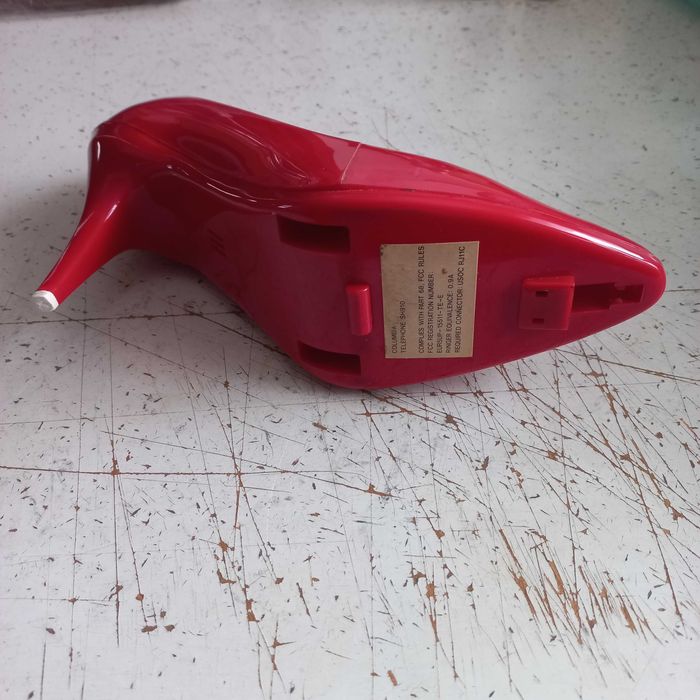 Telefone antigo em forma de sapato