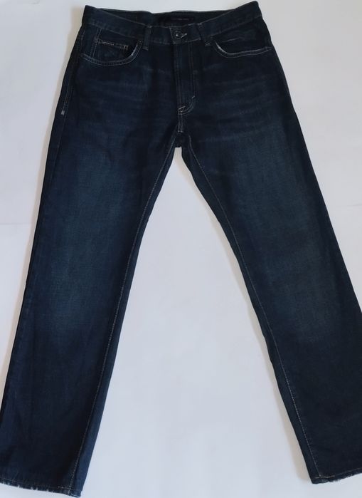 Джинси з потертостями