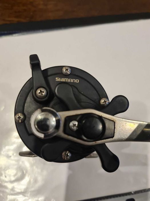 kołowrotek shimano triton 100-G