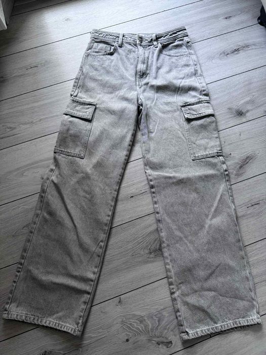 Spodnie jeansowe jeansy damskie jasnoszare Cropp