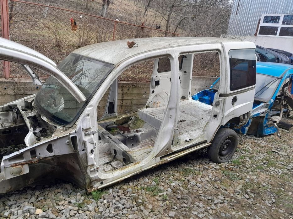 Кузовні деталі фіат добло 01-09.Ланжерони,верхи,боковини,двері, крила.