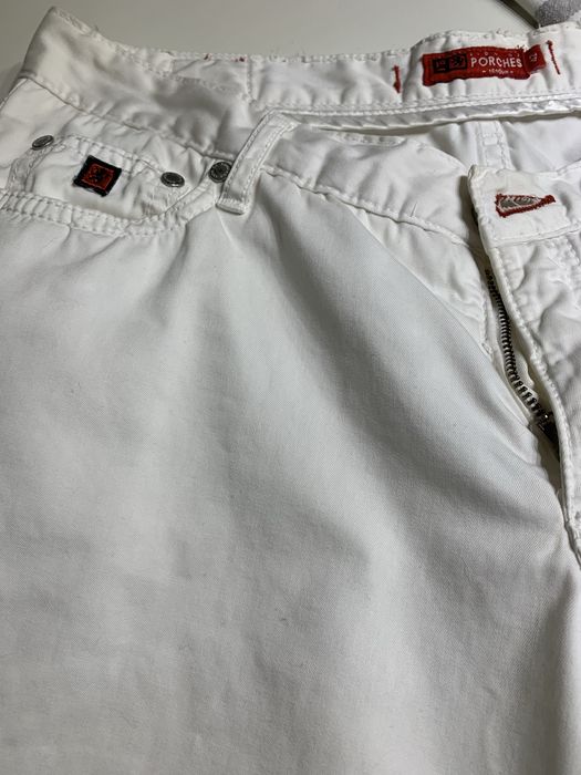 Calças Lion of porches