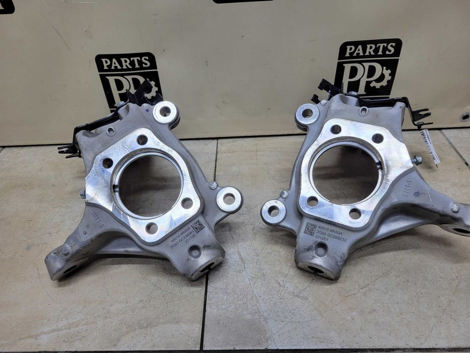 Цапфа кулак поворотний передня Nissan Rogue T33 2021 2022 2023 + 23K