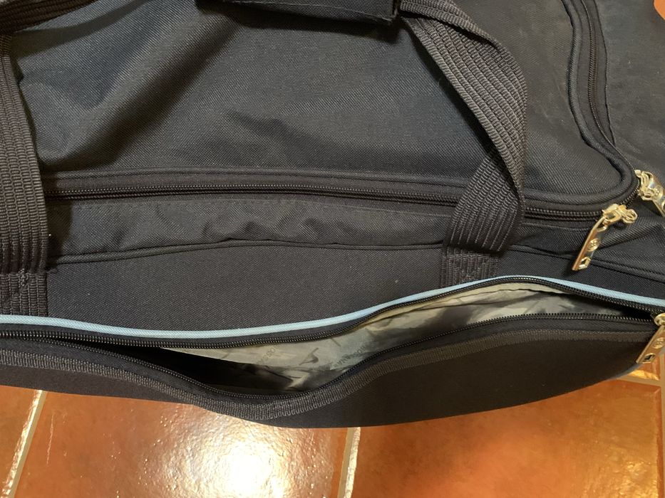 Saco de viagem grande.