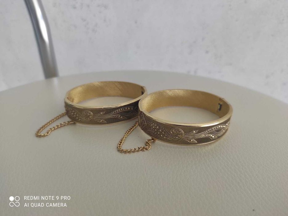 Золотой шарнирный браслет KREMENTZ.