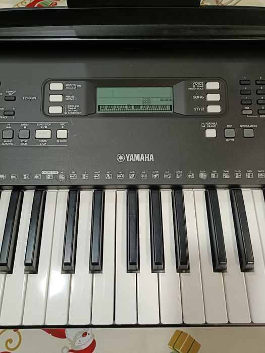 Piano elétrico portátil