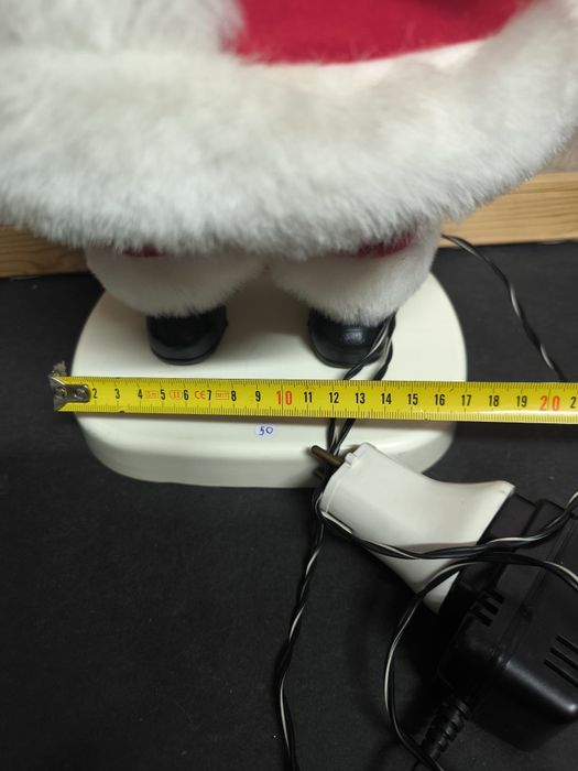 Pai Natal com Vela Luminosa e movimentos.
Figura decorativa de Pai Nat