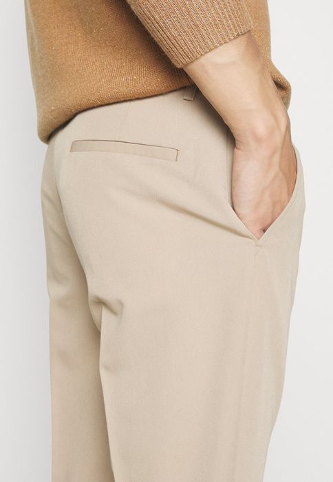 Spodnie chinosy beżowe Lindbergh M