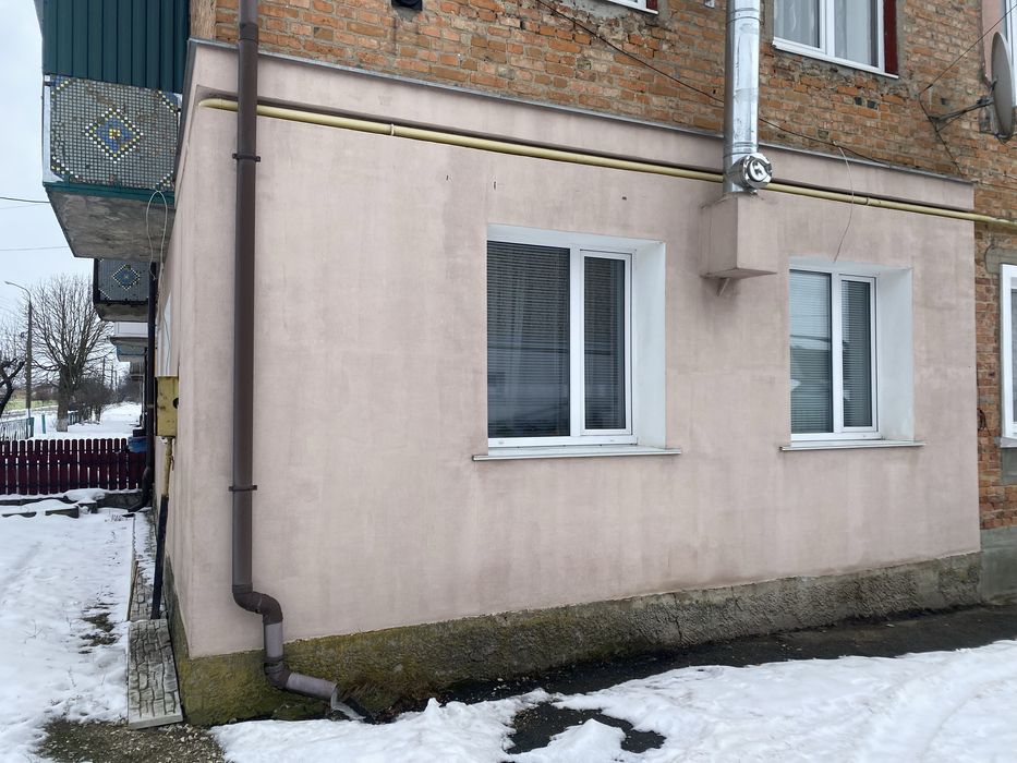 Квартира з земельною ділянкою!