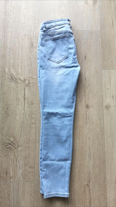Spodnie jeansowe damskie z ozdobnymi guzikami rozm.XL