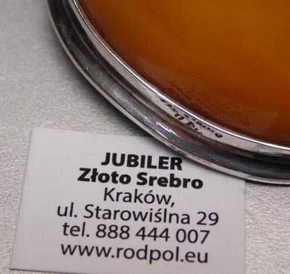 Okazała broszka miodowy bursztyn srebrna oprawa.