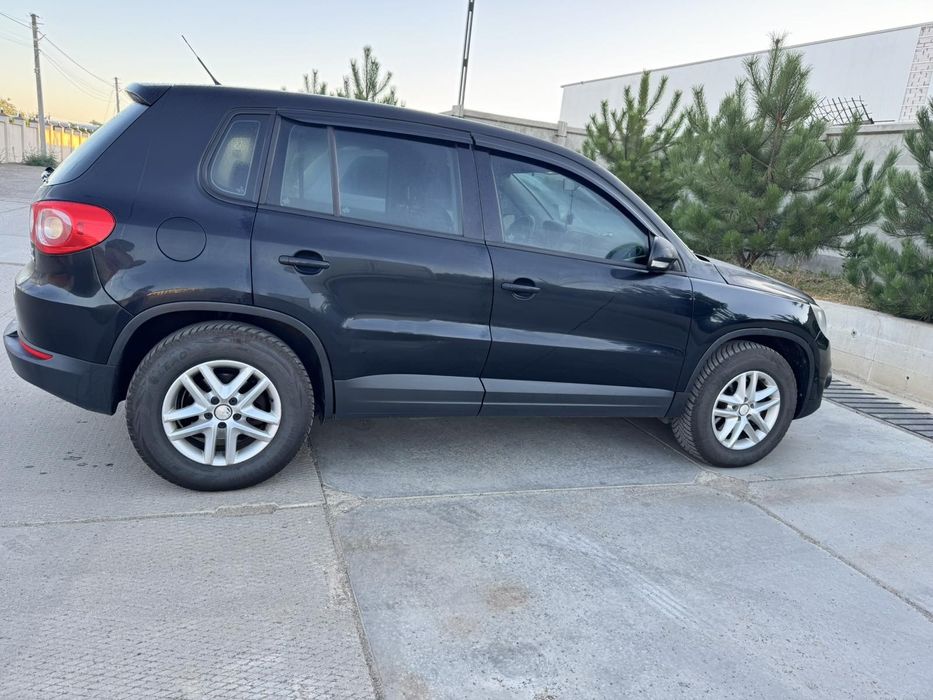 Volkswagen Tiguan 2011 VIN WVGBV7AX3BW535625 фото оголошення 3 з 8