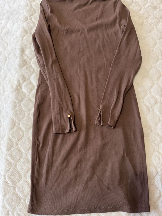 Женский костюм .