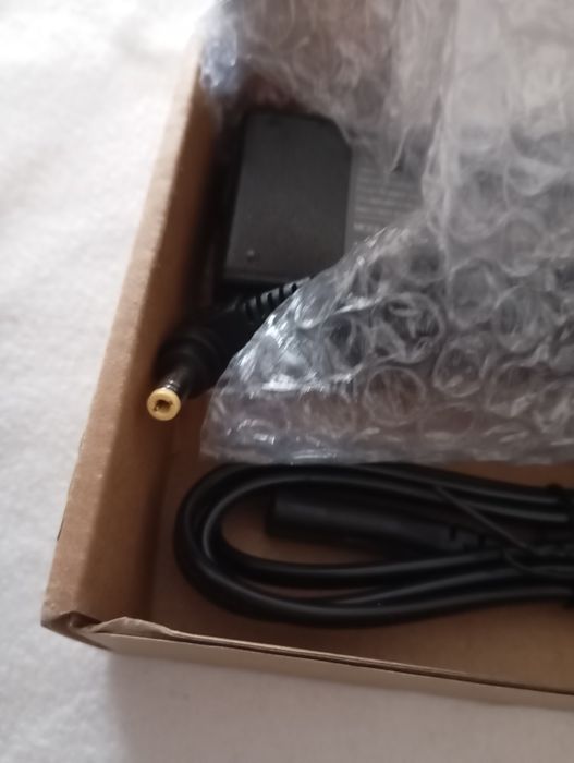 Computer charger

- Includes power cable.64297968496898122