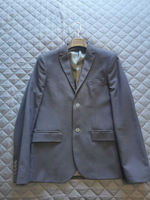 Blazer azul marinho em muito bom estado