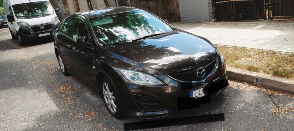 Uszkodzony samochód osobowy Mazda 6