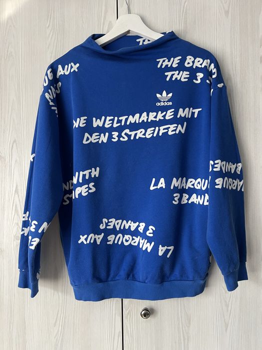 Niebieska bluza Adidas BK5998 NYC Graffiti Crew Sweatshirt