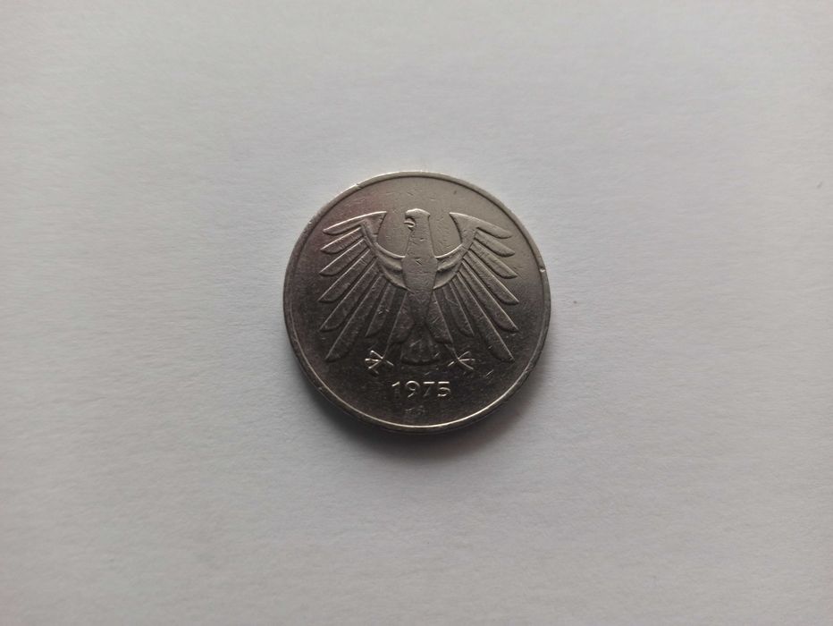 Polskie monety plus marka niemiecka