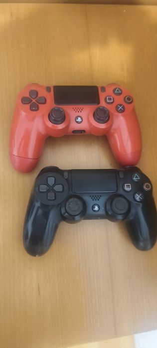 2 comandos PlayStation...p/ peças