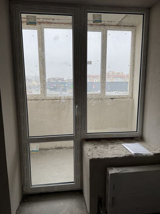 Нове вікно с дверами