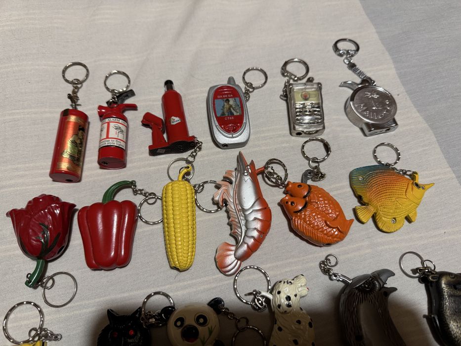 Lote de 32 porta-chaves/isqueiros - vazios