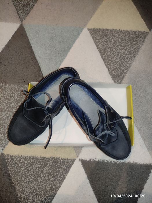 Sapatos de vela azul