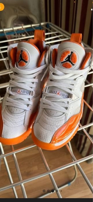 Jordan 14 branco e laranja