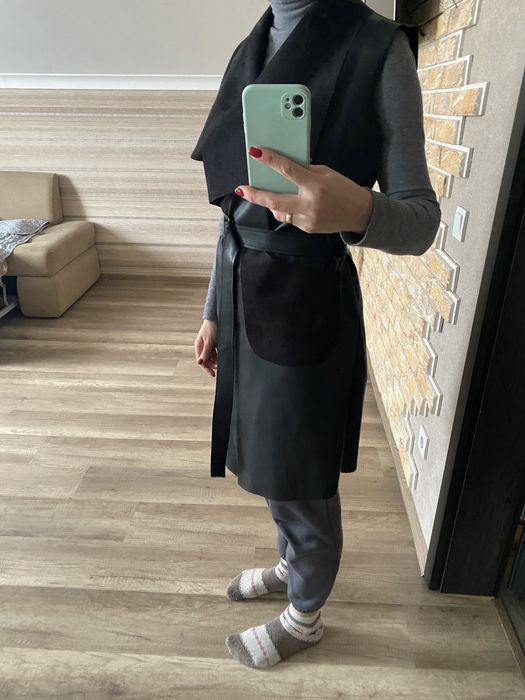 Жіноча жилетка