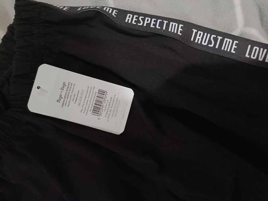 Nowe czarne legginsy 158