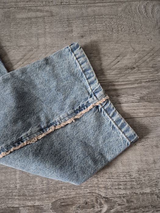 Luźne spodnie jeansy baggy Bershka M