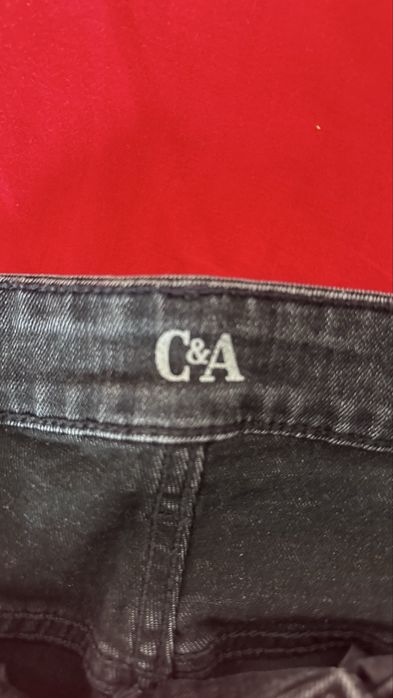 Calça flare preta da C&A