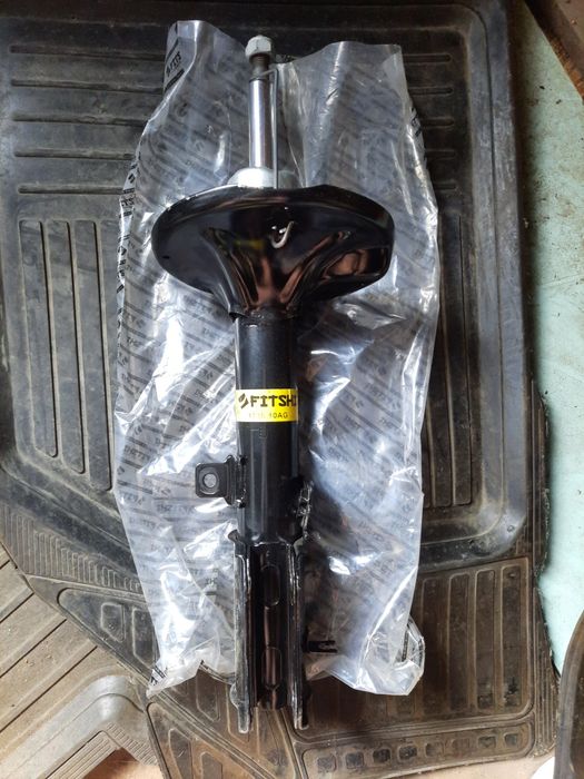 Амортизаційна стійка задня Geely Emgrang EC8