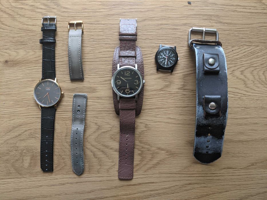 trzy zegarki na rękę, timex oraz inne