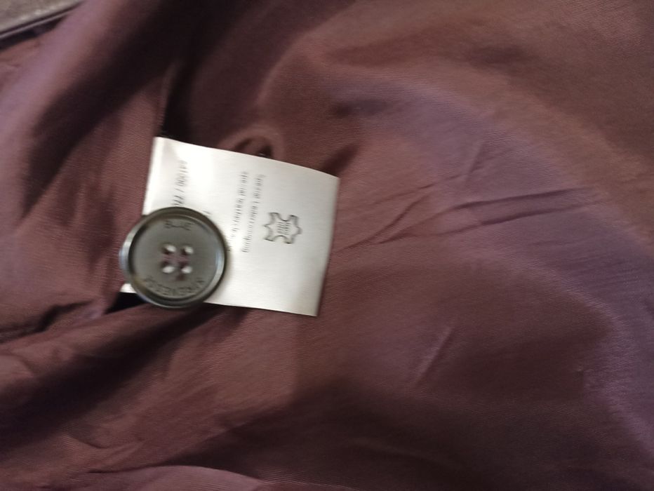 Жіночий шкіряний плащ