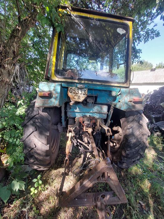 Продам трактор в робочому стані в звязку з переїздом.Всі питання по  телефону.