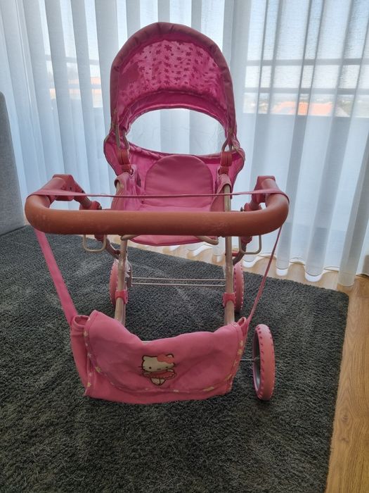Conjunto  carrinho cama alcofa e saco hello kitty  como novo