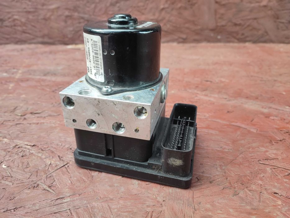 BMW E90 / E91 / E87 ORYGINALNA POMPA ABS / DSC + Sterownik pompy hamulcowej o nr. 34 51 6 776 055 OEM Europa Sprawny w 100%