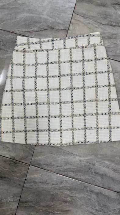 Твідова спідниця