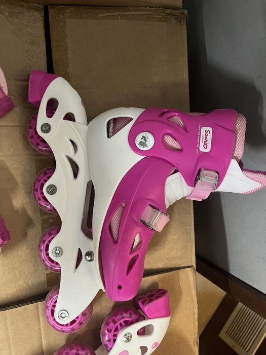 Patins de crianca com proteções para joelhos e cotovelos