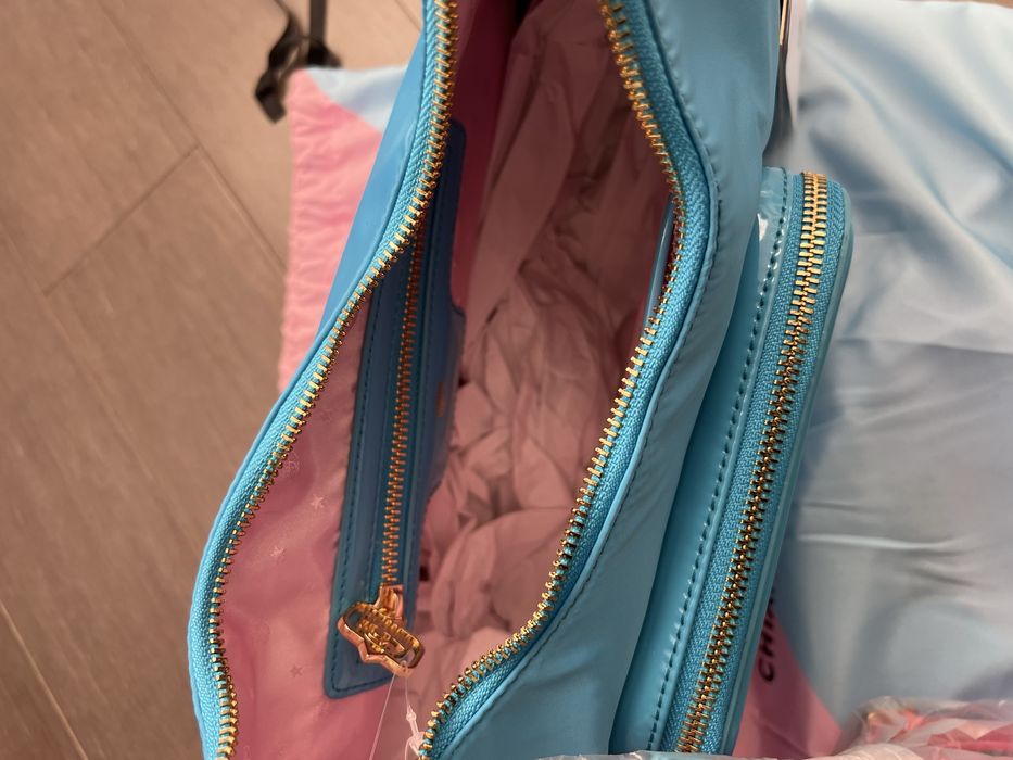 Chiara Ferragni torebka niebieska złote elementy evil eye