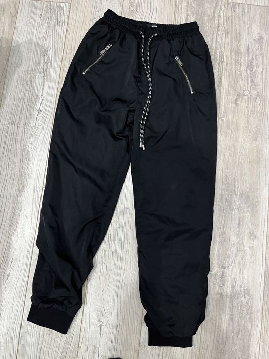Spodnie Nowe Joggery Czarne Śliskie Sznurki Kieszenie