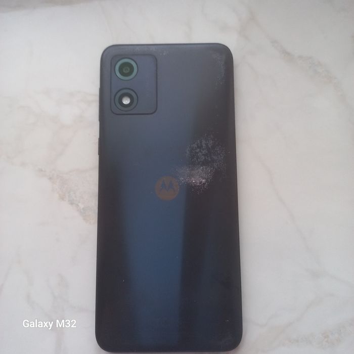 Телефон Моторола  Е13