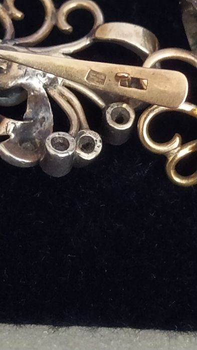 Brincos de ouro com prata