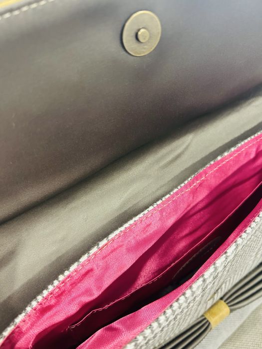 Pochete NOVA da marca ÉMOI. Em tecido com apontamentos em pele