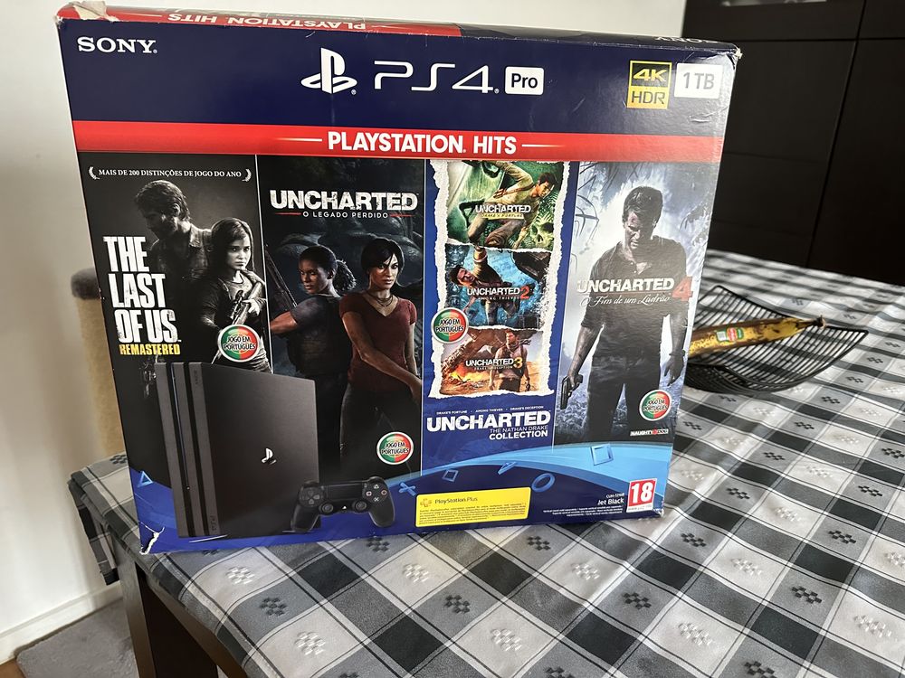 Sony PlayStation 4 Pro 1TB + The Last of Us + Uncharted Collection + Uncharted  4 + O Legado Perdido