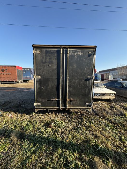 Тентована буда MAN