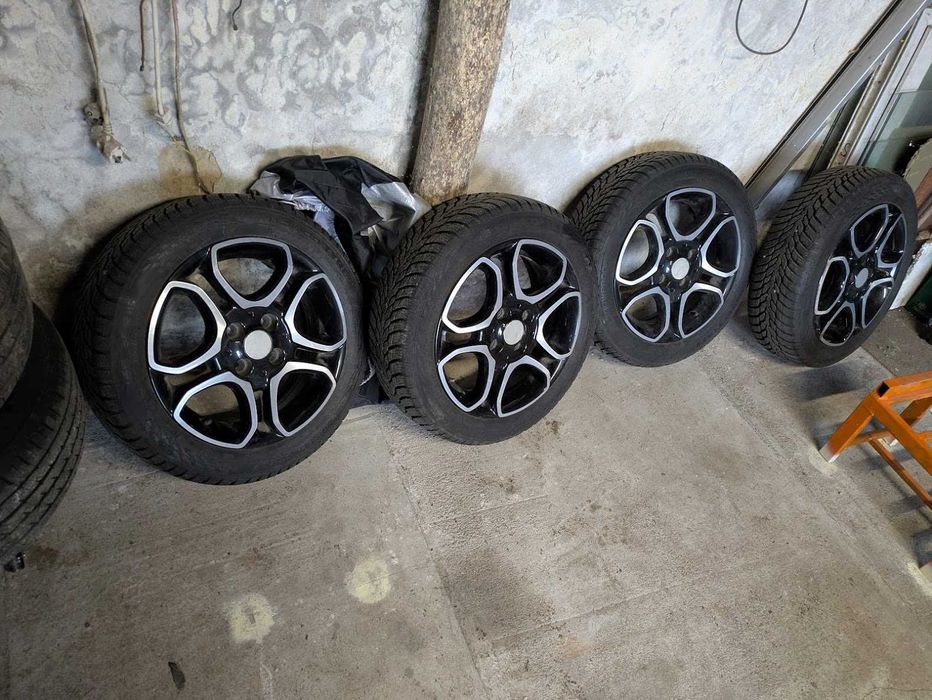 Felgi 4x100 z oponami zimowymi.