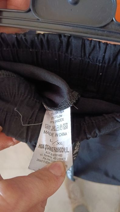 Calças novas, preço unitário