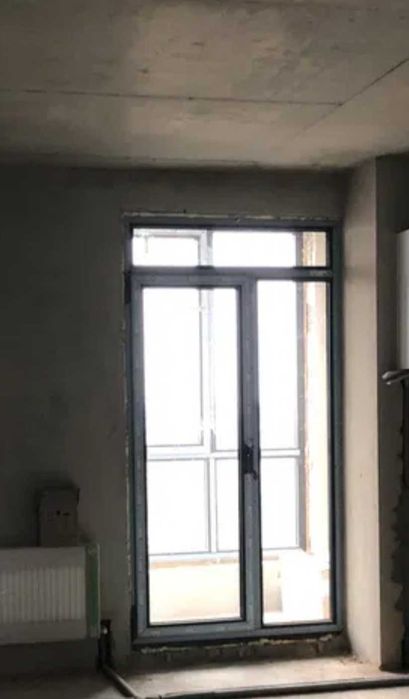 Пластикове вікно 2,45x1,25м. 3-х камерне з дверима.